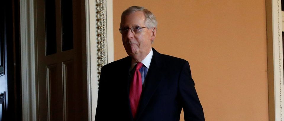 U.S. Senate Majority Leader Mitch McConnell exits a policy lunch to lead a news conference at the U.S. Capitol in Washington