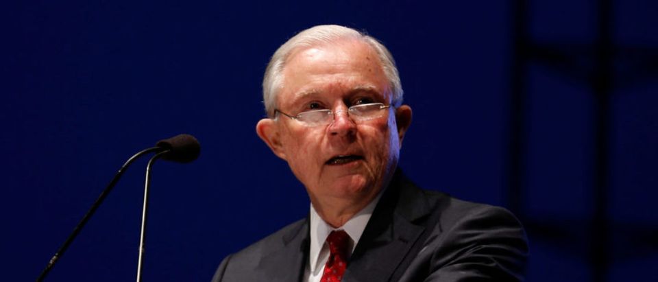 U.S. Attorney General Jeff Sessions delivers remarks at the National Law Enforcement Officers Memorial Funds 30th annual candlelight vigil in Washington, U.S., May 13, 2018. REUTERS/Joshua Roberts
