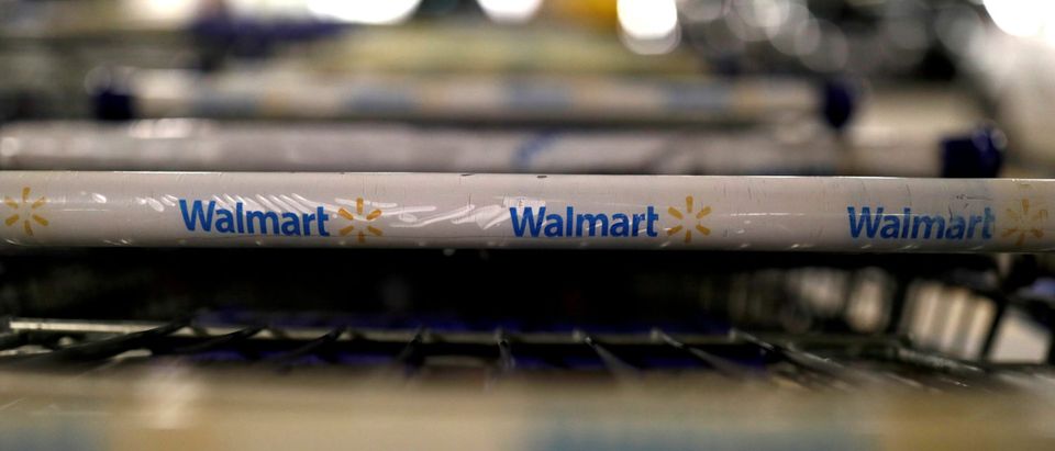 FILE PHOTO: The logo of Walmart is seen on shopping trolleys at their store in Sao Paulo, Brazil February 14, 2018. REUTERS/Paulo Whitaker/File photo