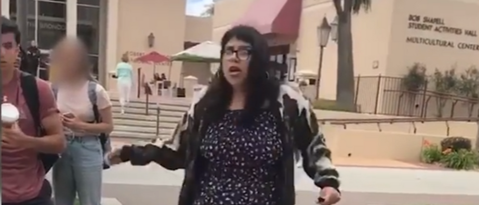 A Santa Clara University student gets vocal over an anti-socialism display. (Photo Credit: YouTube/Daily Caller News Foundation)