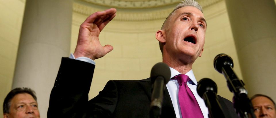 Rep. Trey Gowdy (C), flanked by committee members, speaks to reporters after questioning Democratic presidential candidate Hillary Clinton in a day-long testimony before the House Select Committee on Benghazi, on Capitol Hill in Washington Oct. 22, 2015. REUTERS/Jonathan Ernst