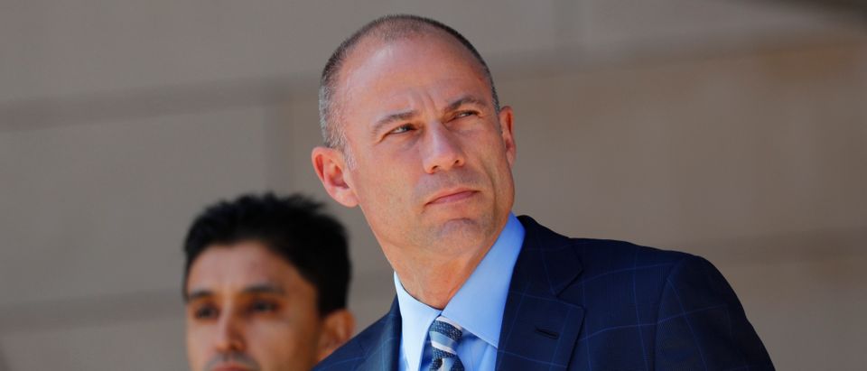 Michael Avenatti, lawyer for adult-film actress Stephanie Clifford, also known as Stormy Daniels, speaks to the media outside the U.S. District Court for the Central District of California after a hearing regarding Clifford's case against Donald J. Trump in Los Angeles, California, April 20, 2018. REUTERS/Mike Blake - HP1EE4K1E8CV1