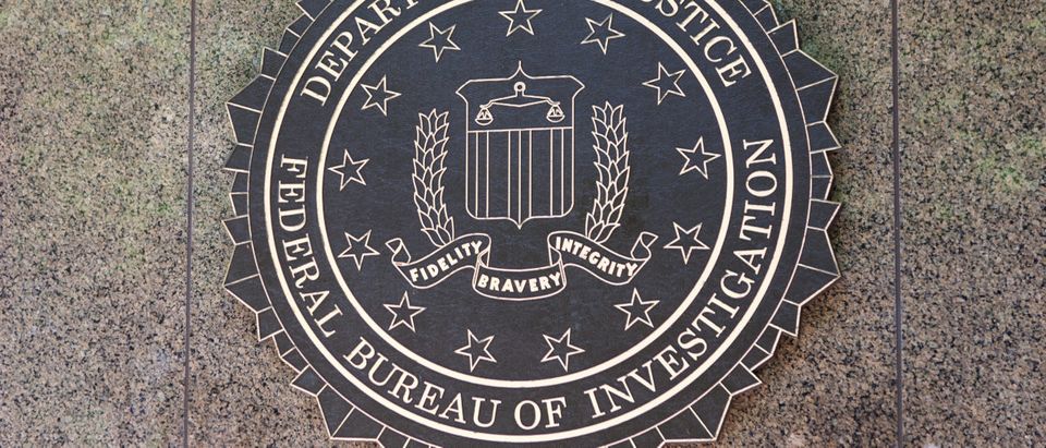 FBI seal located outside the J. Edgar Hoover F.B.I. Building in downtown Washington, DC on June 1, 2014. Shutterstock/Mark Van Scyoc