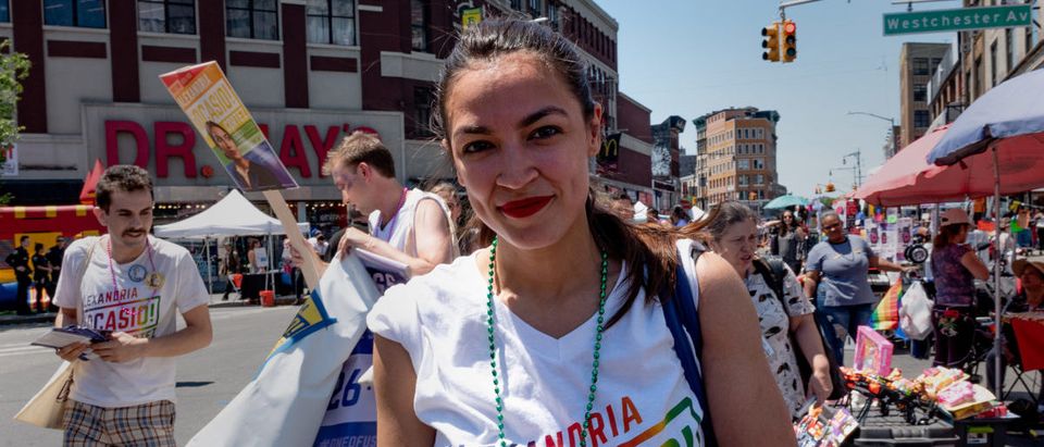 Alexandria Ocasio-Cortez marches during the Bronx's pride parade in the Bronx borough of New York City