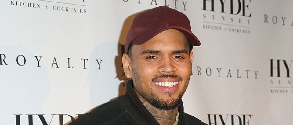 Recording artist Chris Brown attends a listening party for his latest album, 'Royalty' at HYDE Sunset: Kitchen + Cocktails on December 15, 2015 in West Hollywood, California. (Photo by Imeh Akpanudosen/Getty Images)