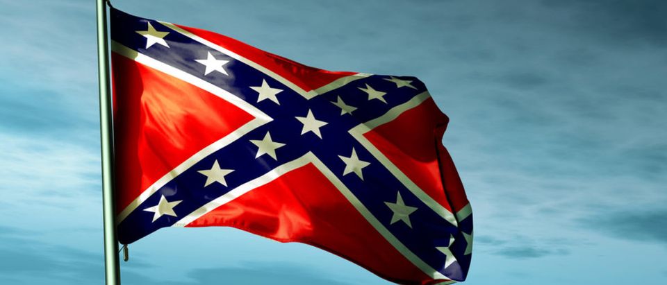 A Confederate flag waves in the wind. (Shutterstock/Jiri Flogel)