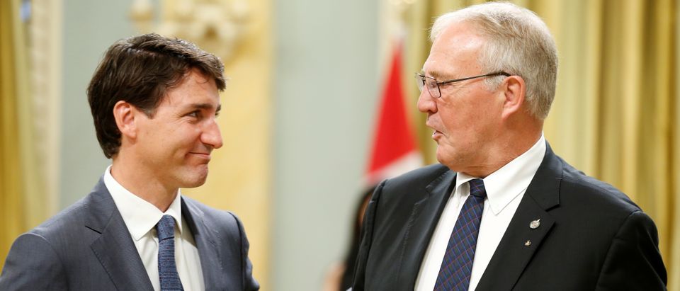 Canada's PM Trudeau congratulates Bill Blair during a cabinet shuffle at Rideau Hall in Ottawa
