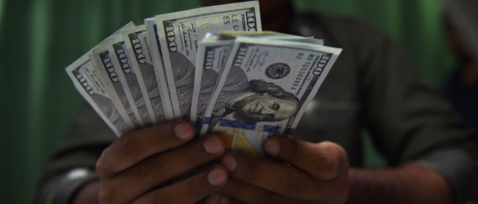 Dollars (Photo credit RIZWAN TABASSUM/AFP/Getty Images)