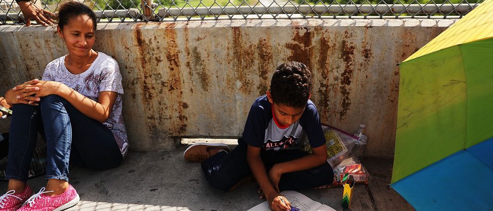 Despite Trump Executive Order, Over 2300 Migrant Children Still Held In Cam