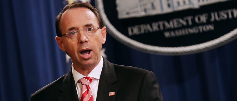 U.S. Deputy Attorney General Rod Rosenstein holds a news conference at the Department of Justice July 13, 2018 in Washington, DC. Rosenstein announced indictments against 12 Russian intelligence agents for hacking computers used by the Democratic National Committee, the Hillary Clinton campaign, the Democratic Congressional Campaign Committee and other organizations. (Photo by Chip Somodevilla/Getty Images)