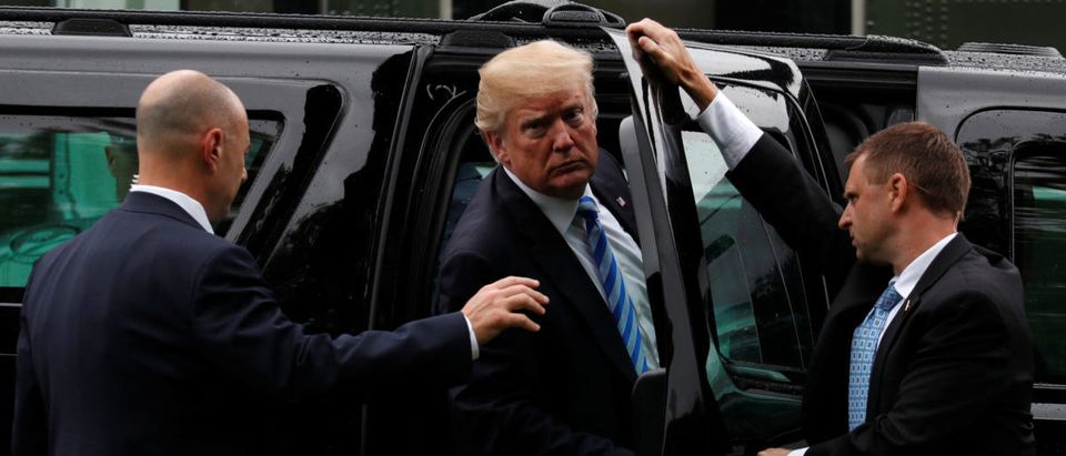 Trump arrives to visit the first lady at Walter Reed National Military Medical Center in Bethesda, Maryland