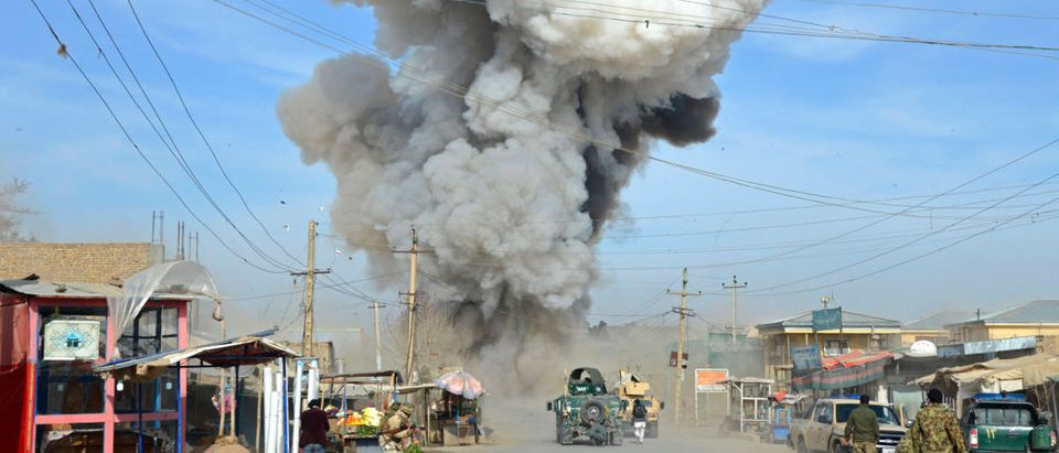 Smoke rises in the sky after a suicide car bomb attack in Kunduz province February 10, 2015. Taliban insurgents launched an attack on a police headquarters in northern Afghanistan, provincial police spokesman Sayed Sarwar Hosseini said. At least two policemen were wounded in the attack, and five suicide attackers were killed by Afghan forces, Hosseini reported. REUTERS/Stringer