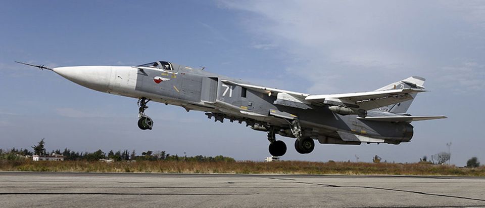 File photo from Russia's Defence Ministry shows a Sukhoi Su-24 fighter jet taking off from the Hmeymim air base near Latakia