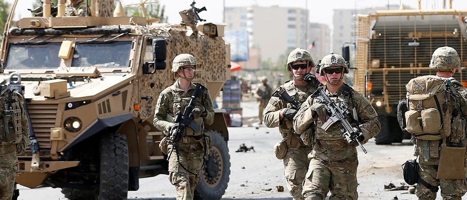 U.S. and NATO troops arrive at the site of a car bomb attack in Kabul, Afghanistan