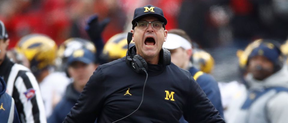 COLUMBUS, OH - NOVEMBER 26: Head coach Jim Harbaugh of the Michigan Wolverines argues a call on the sideline during the first half against the Ohio State Buckeyes at Ohio Stadium on November 26, 2016 in Columbus, Ohio. (Photo by Gregory Shamus/Getty Images)