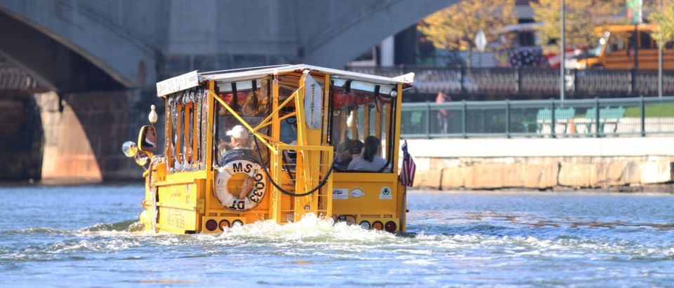 The Boston Duck Tours, which uses amphibious buses of varying colors, taking tourists for a ride on October 17, 2014.
