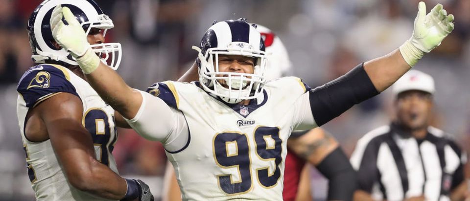 GLENDALE, AZ - DECEMBER 03: Defensive end Aaron Donald #99 of the Los Angeles Rams reacts after a tackle against the Arizona Cardinals during the second half of the NFL game at the University of Phoenix Stadium on December 3, 2017 in Glendale, Arizona. The Rams defeated the Cardinals 32-16. (Photo by Christian Petersen/Getty Images)