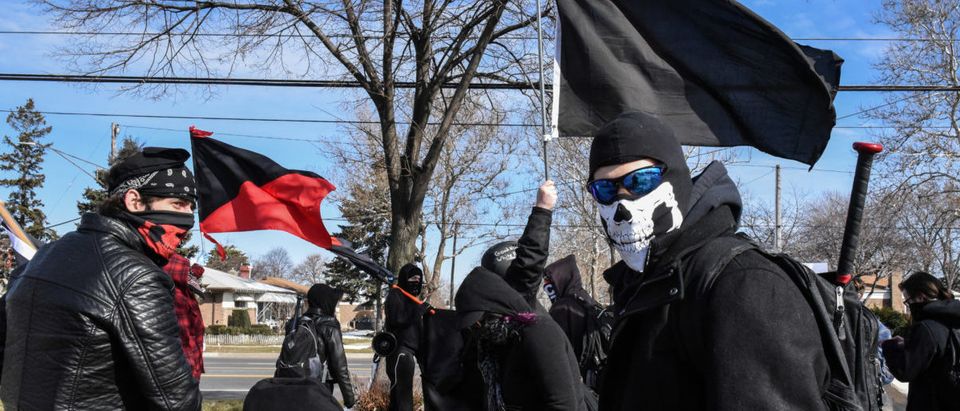 Members of the Great Lakes anti-fascist organization (Antifa) protest against the Alt-right outside a hotel in Warren, Michigan, U.S., March 4, 2018. REUTERS/Stephanie Keith