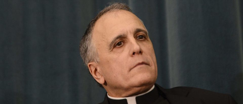 U.S. Cardinal Daniel DiNardo listens during a press conference at the North American College on March 5, 2013 in Rome. Photo: ANDREAS SOLARO,ANDREAS SOLARO/AFP/Getty Images
