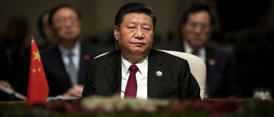 China's President Xi Jinping looks on during the BRICS Summit in Johannesburg