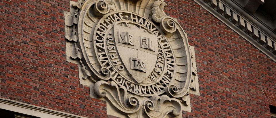 A seal hangs over a building at Harvard University in Cambridge, Massachusetts November 16, 2012. REUTERS/Jessica Rinaldi
