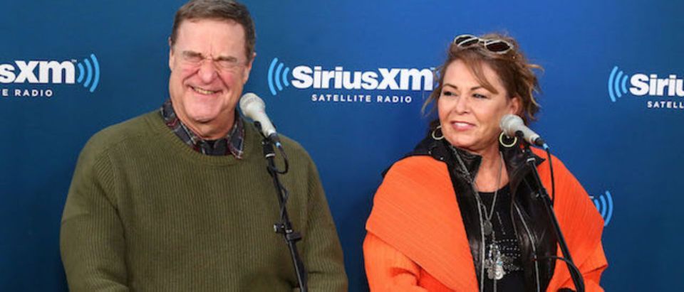 Actors John Goodman and Roseanne Barr speak during SiriusXM's Town Hall with the cast of Roseanne on March 27, 2018 in New York City. (Photo by Astrid Stawiarz/Getty Images for SiriusXM)