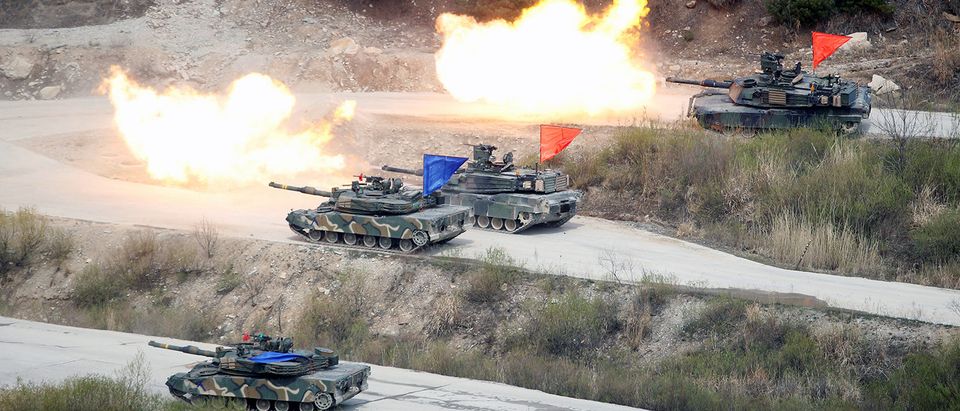 South Korean Army K1A1 and U.S. Army M1A2 tanks fire live rounds during a U.S.-South Korea joint live-fire military exercise, at a training field, near the demilitarized zone, separating the two Koreas in Pocheon, South Korea April 21, 2017. Picture taken on April 21, 2017. REUTERS/Kim Hong-Ji