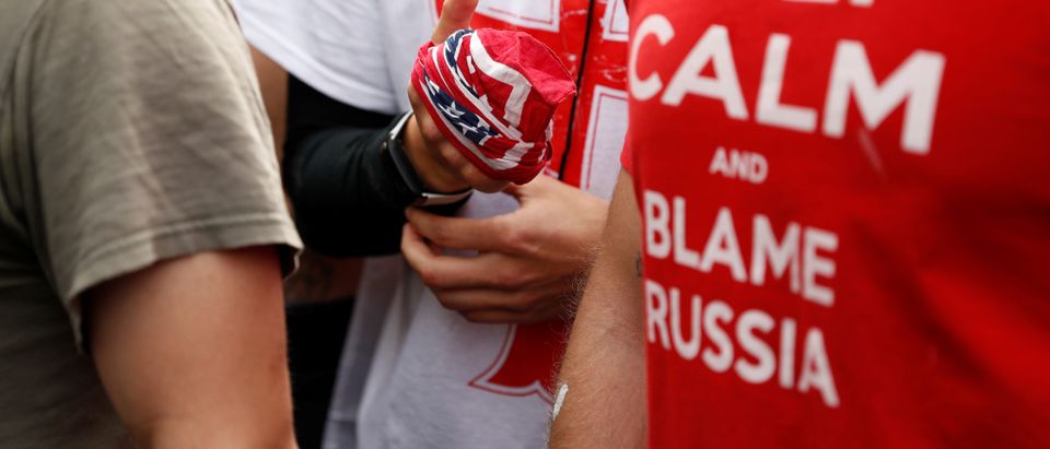 A demonstrator wraps a cloth around his fist during a Patriots Day Free Speech Rally in Berkeley, California