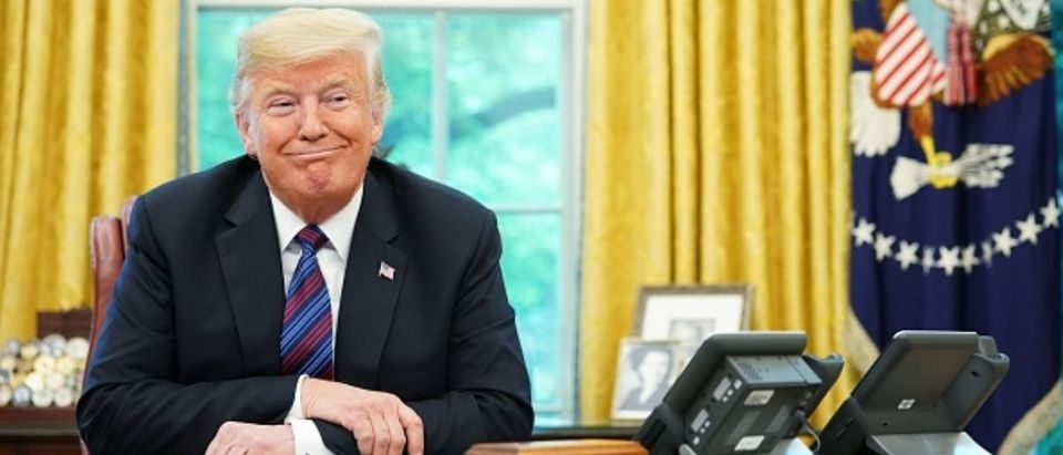 President Donald Trump listens during a phone conversation with Mexico's President Enrique Pena Nieto on trade in the Oval Office of the White House in Washington, D.C., on August 27, 2018. (Photo: MANDEL NGAN/AFP/Getty Images)
