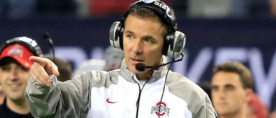 ARLINGTON, TX - JANUARY 12: Head Coach Urban Meyer of the Ohio State Buckeyes points in the second half against the Oregon Ducks during the College Football Playoff National Championship Game at AT&T Stadium on January 12, 2015 in Arlington, Texas. (Photo by Jamie Squire/Getty Images)