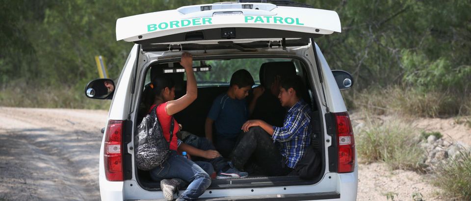 ROMA, TX - APRIL 14: Central American children are transported for processing by the U.S. Border Patrol after they crossed the Rio Grande from Mexico into the United States to seek asylum on April 14, 2016 in Roma, Texas. Border security and immigration, both legal and otherwise, continue to be contentious national issues in the 2016 Presidential campaign. (Photo by John Moore/Getty Images)