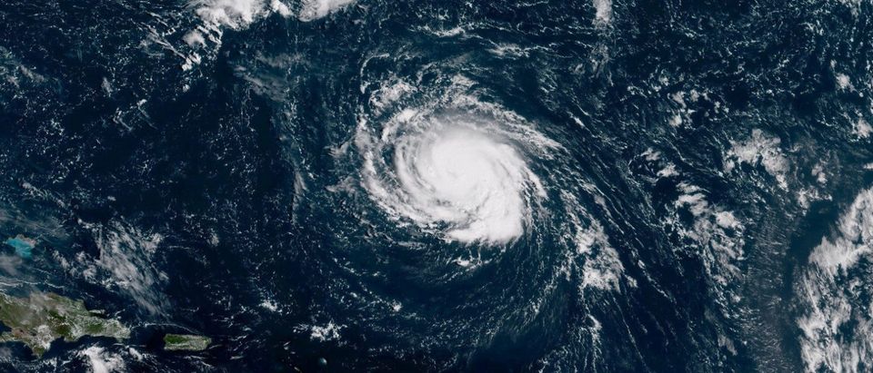 Hurricane Florence seen over the Atlantic Ocean, about 750 miles southeast of Bermuda in this handout photo provided by the National Oceanic and Atmospheric Administration on September 9, 2018. NOAA NWS National Hurricane Center/Handout via REUTERS