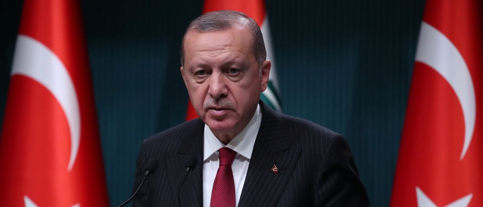 Turkish President Tayyip Erdogan attends a news conference in Ankara
