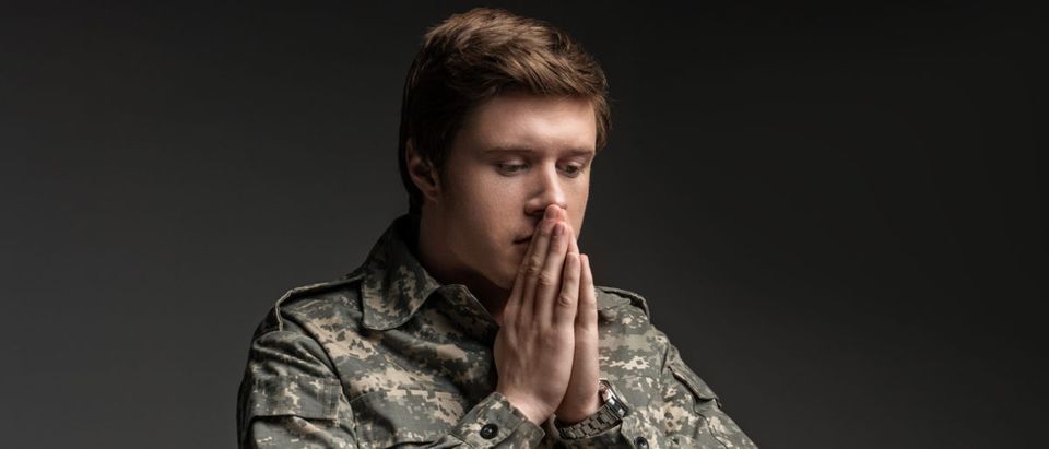 A soldier looks downcast. Shutterstock photo via user Olena Yakobchuk