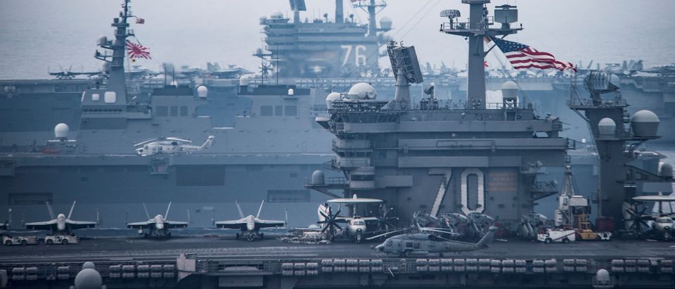 U.S. Navy aircraft carriers USS Carl Vinson (R) and USS Ronald Reagan sail with their strike groups and Japanese naval ships during training in the Sea of Japan, June 1, 2017. U.S. Navy/Mass Communication Specialist 2nd Class Z.A. Landers/Handout via REUTERS