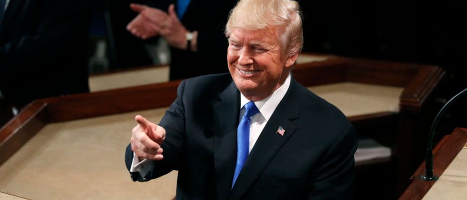 U.S. President Trump smiles while delivering his State of the Union address in Washington