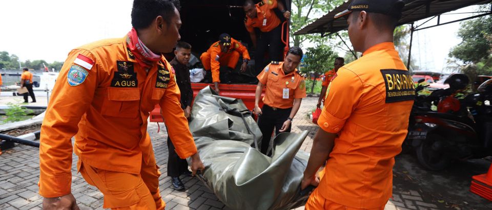 Members of a rescue team prepare to search for survivors from the Lion Air flight JT 610, which crashed into the sea, at Jakarta seaport on October 29, 2018. - The Indonesian Lion Air plane carrying 188 passengers and crew crashed into the sea on October 29, officials said, moments after it had asked to be allowed to return to Jakarta. RESMI MALAU/AFP/Getty Images