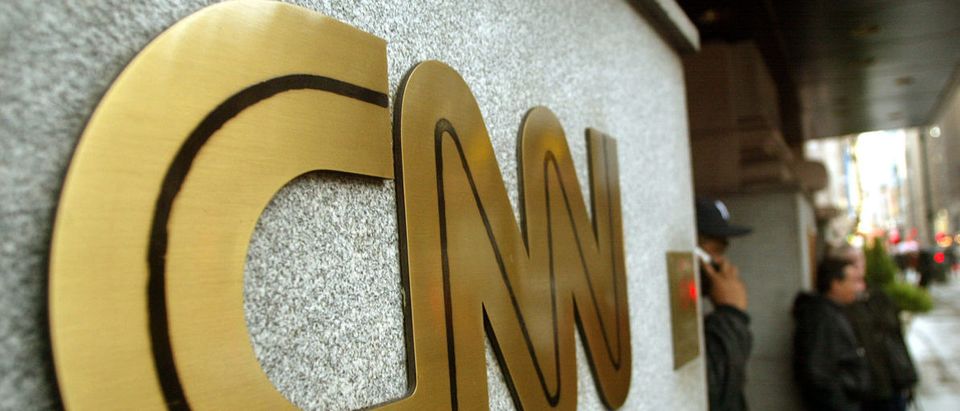 NEW YORK - NOVEMBER 12: The CNN sign is seen outside its headquarters November 12, 2002 in New York City. The proposed merger between CNN and Walt Disney Co.'s ABC News is progressing and could reach an agreement on principle by January, according to negotiators close to the deal. (Photo by Mario Tama/Getty Images)