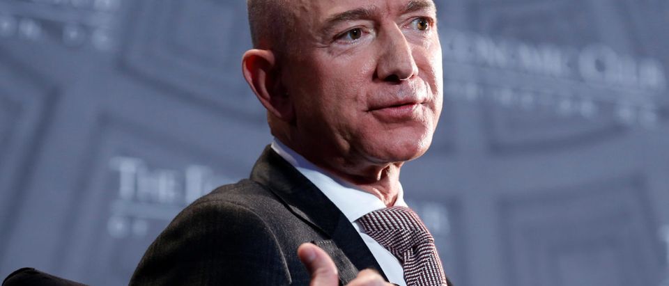 Jeff Bezos, president and CEO of Amazon and owner of The Washington Post, speaks at the Economic Club of Washington D.C.'s "Milestone Celebration Dinner" in Washington, U.S., Sept. 13, 2018. REUTERS/Joshua Roberts