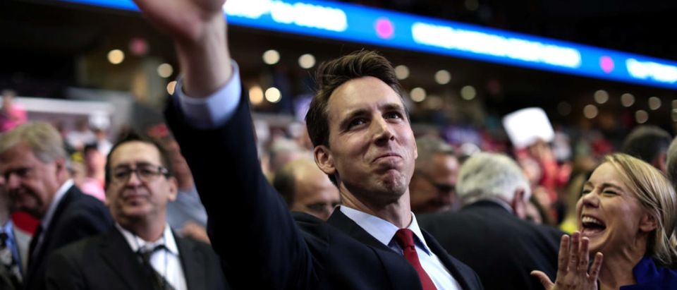 Missouri Attorney General and Republican U.S. Senate candidate Josh Hawley waves at a campaign rally with U.S. President Donald Trump in Springfield
