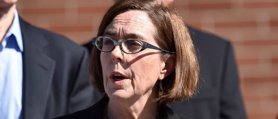 Oregon Gov. Kate Brown reacts during a press conference in Roseburg, Oregon, on Oct. 2, 2015. (Photo: Josh Edelson/AFP/Getty Images)