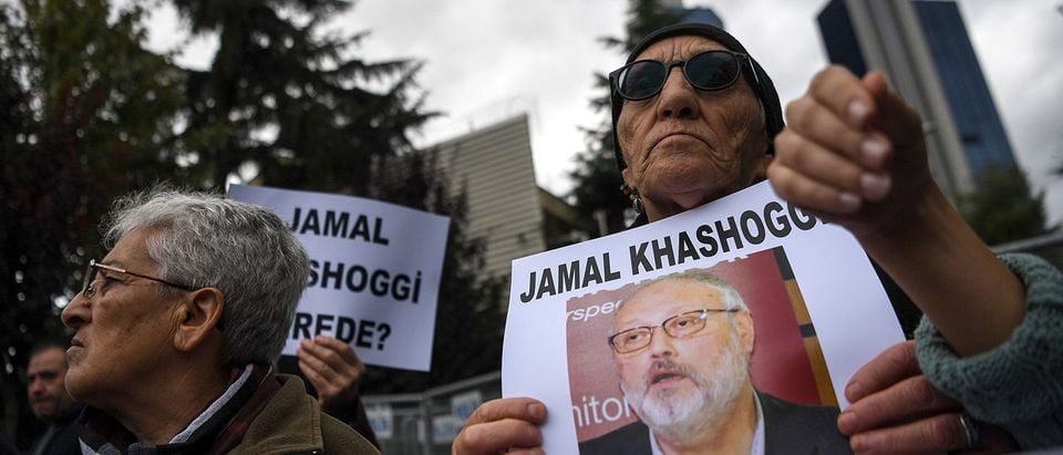 Protesters hold a portrait of missing journalist and Riyadh critic Jamal Khashoggi reading "Jamal Khashoggi is missing since October 2" during a demonstration in front of the Saudi Arabian consulate on Oct. 9, 2018 in Istanbul. - Khashoggi, a Washington Post contributor, vanished last on Oct. 2 after entering the Saudi Arabian consulate to receive official documents ahead of his marriage to a Turkish woman. A Turkish government source told AFP at the weekend that the police believe the journalist "was killed by a team especially sent to Istanbul and who left the same day". OZAN KOSE/AFP/Getty Images