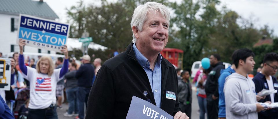 HAYMARKET, VA - OCTOBER 20: Virginia State Attorney General Mark Herring (C) participates in the annual Haymarket Day parade October 20, 2018 in Haymarket, Virginia. Democratic U.S. House candidate and Virginia State Sen. Jennifer Wexton (D-33rd District) is challenging incumbent Rep. Barbara Comstock (R-VA) for the House seat that has been in Republican hands since 1981. Wexton is currently leading Comstock in most of the polls. (Photo by Alex Wong/Getty Images)