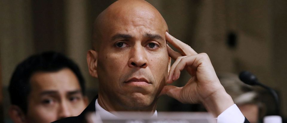 Senate Judiciary Committee member Sen. Cory Booker (D-NJ) listens to opening statements before hearing from Christine Blasey Ford in the Senate Judiciary Committee in the Dirksen Senate Office Building at the Capitol Hill in Washington
