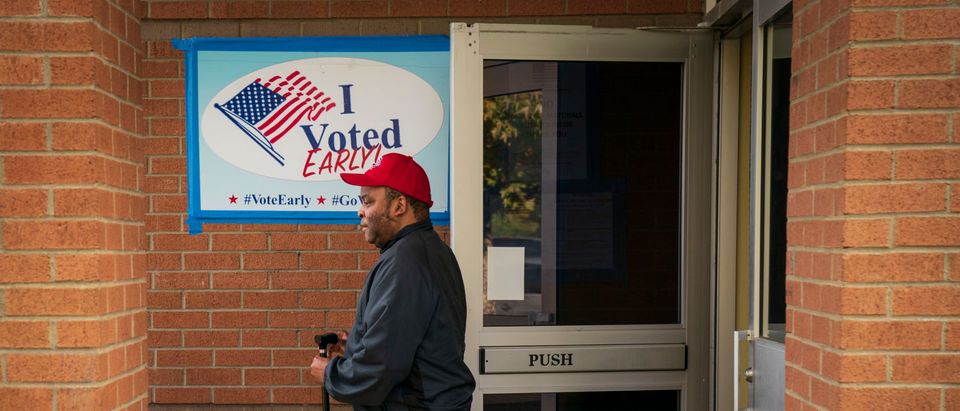NASHVILLE, TN - OCTOBER 30: A voter exits a polling place during early voting at the Bordeaux Branch of the Nashville Public Library, October 30, 2018 in Nashville, Tennessee. Bredesen, a former governor of Tennessee, is running in a tight race against U.S. Rep. Marsha Blackburn (R-TN) to fill the seat left open by Sen. Bob Corker (R-TN), who opted not to seek reelection. (Photo by Drew Angerer/Getty Images)