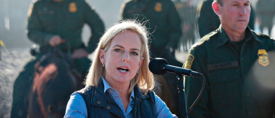 Kirstjen M. Nielsen, Secretary of the Department of Homeland Security, speaks to reporters during a press conference at Borderfield State Park along the United States-Mexico Border fence in San Ysidro, California on November 20, 2018. - A US federal judge temporarily blocked Donald Trump's administration from denying asylum to people who enter the country illegally, prompting the president to allege Tuesday that the court was biased against him. (Photo by Sandy Huffaker / AFP) (Photo credit should read SANDY HUFFAKER/AFP/Getty Images)