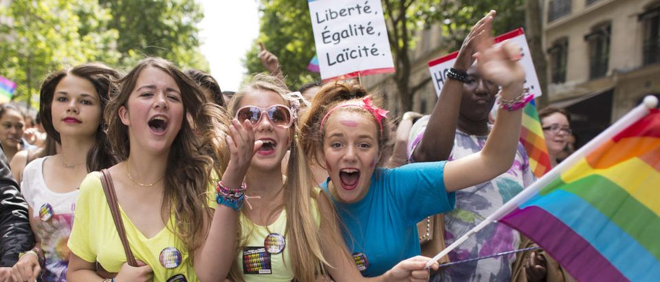 Girls parade during the homosexual, lesbian, bisexual and transgender (HLBT) visibility march, the Gay Pride, on June 29, 2013 in Paris. (LIONEL BONAVENTURE/AFP/Getty Images)