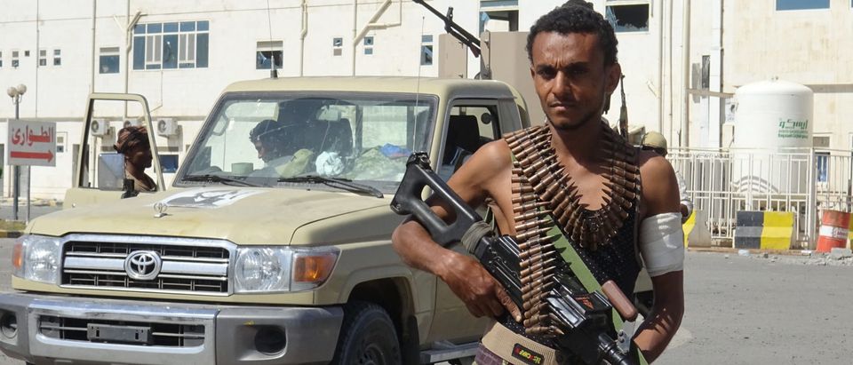 A member of the Yemeni pro-government forces is pictured in front of the May 22 Hospital on the eastern outskirts of port city of Hodeida on November 15, 2018. - Yemen's president has supported a UN push for fresh talks to end almost four years of fighting in his war-torn country, but analysts warn even a diplomatic breakthrough may not spare the port city of Hodeida from fresh military action. (Photo by STRINGER/AFP/Getty Images)