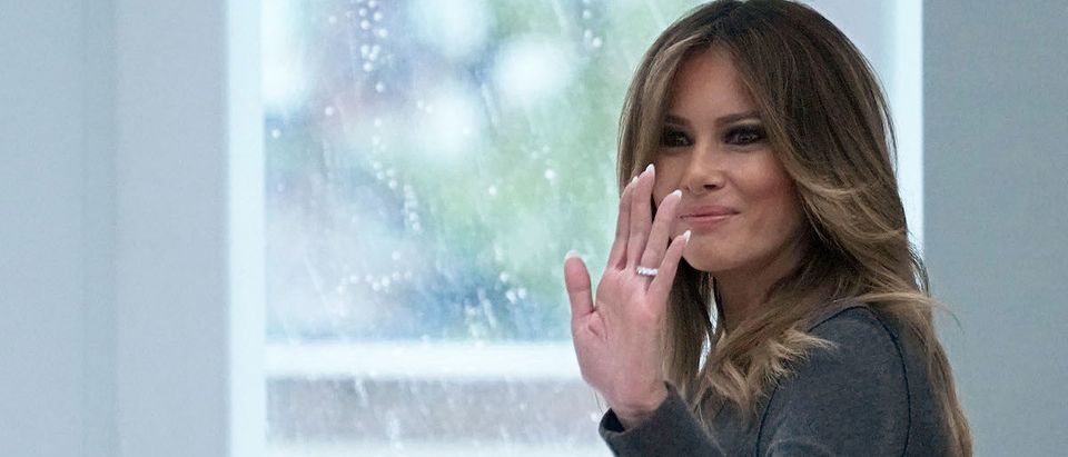 U.S. first lady Melania Trump waves as she leaves the annual conference of Family Online Safety Institute November 15, 2018 at the U.S. Institute of Peace in Washington, DC. The first lady participated in a discussion to end cyberbullying and promote civility online. (Photo by Alex Wong/Getty Images)
