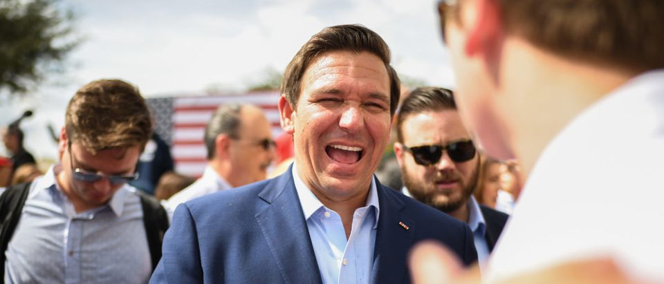 Republican candidate for governor of Florida Ron DeSantis meets supporters as they attend a rally at Freedom Pharmacy on the final day of campaigning in the midterm elections on Nov. 5, 2018 in Orlando, Florida. (Jeff J Mitchell/Getty Images)